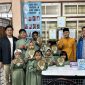 50 mushaf Al-Qur'an didistribusikan langsung oleh para pengurus dan anggota TIDAR Tangsel kepada Masyarakat